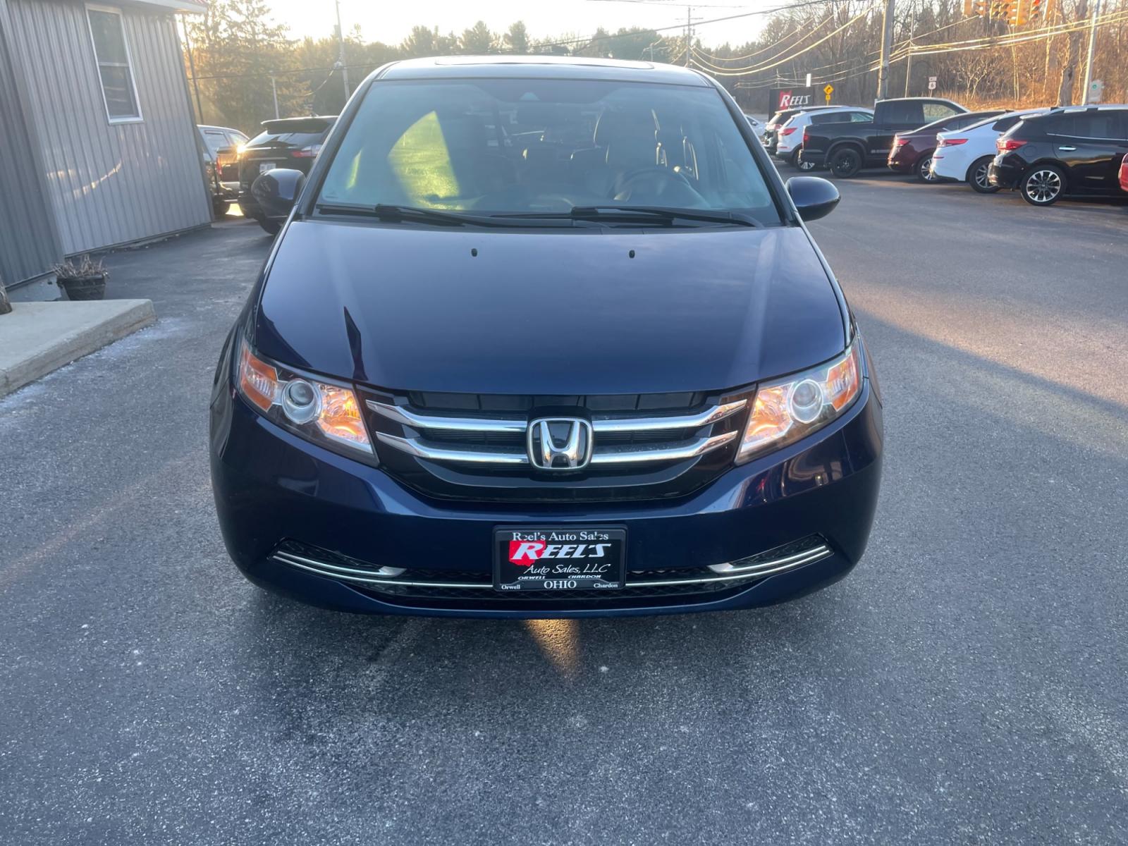 2015 Blue /Gray Honda Odyssey EX-L (5FNRL5H64FB) with an 3.5L V6 SOHC 24V engine, 6-Speed Automatic transmission, located at 11115 Chardon Rd. , Chardon, OH, 44024, (440) 214-9705, 41.580246, -81.241943 - This 2015 Honda Odyssey EX-L offers a luxurious and convenient driving experience, boasting a premium leather interior and sound system, enhancing comfort and entertainment on the go. Its safety and functional features, such as a backup camera, Honda Lane Watch, lane departure warning, and forward c - Photo #1
